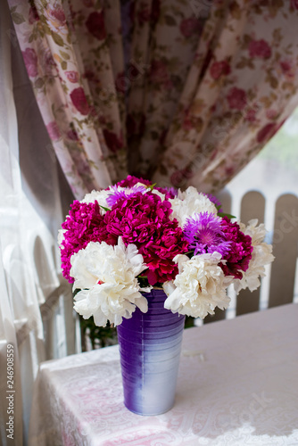 Beautiful flowers in vase on table