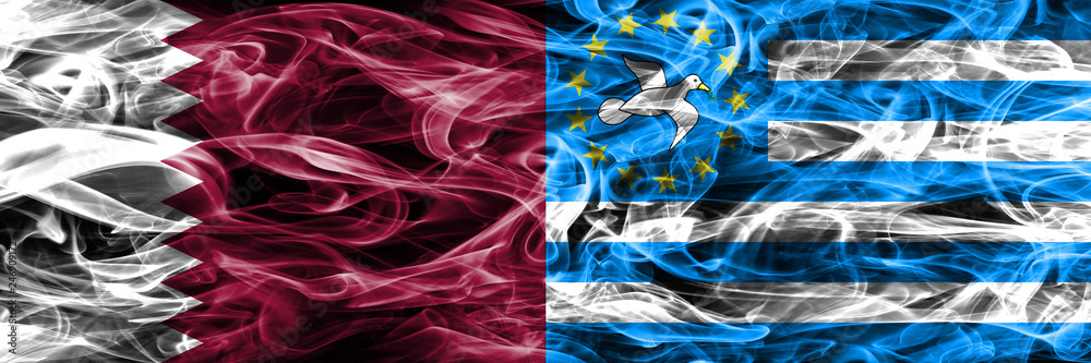 Obraz premium Qatar vs South Cameroon smoke flags placed side by side. United Arab Emirates. UAE.