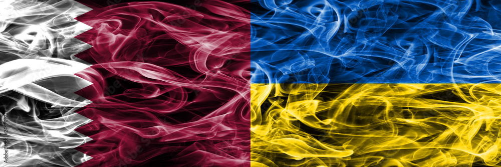 Obraz premium Qatar vs Ukraine, Ukrainian smoke flags placed side by side. United Arab Emirates. UAE.