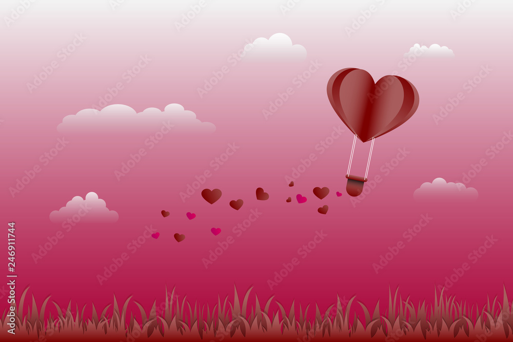 Love and valentine day,Origami made hot air balloon flying over grass with heart float on the sky.paper art and digital craft style.