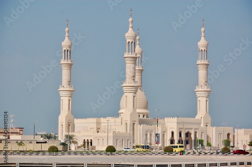 In the morning sunrise, the Sheikh`s Zayed`s Mosque in Ras al Khaimah, UAE stands out on the Corniche photo