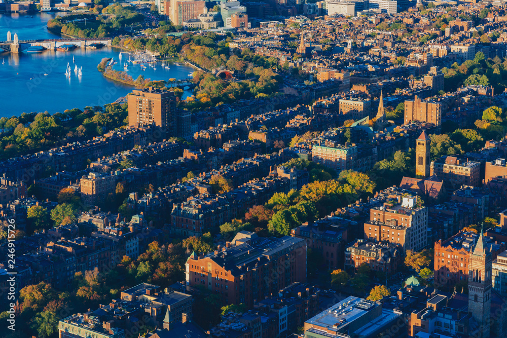 Views of houses of Back Bay area by Charles River at sunset, in Boston, USA