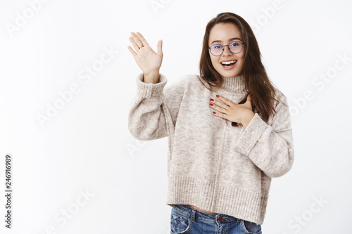 Slika na platnu Girl making promise, swearing keep secret raising one hand and holding arm on he