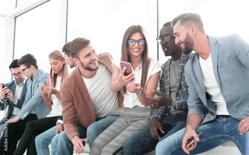 group of young people discussing new information