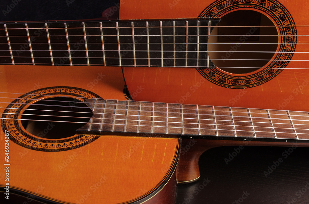 Two acoustic guitars. Close-up Two acoustic guitars. Close-up