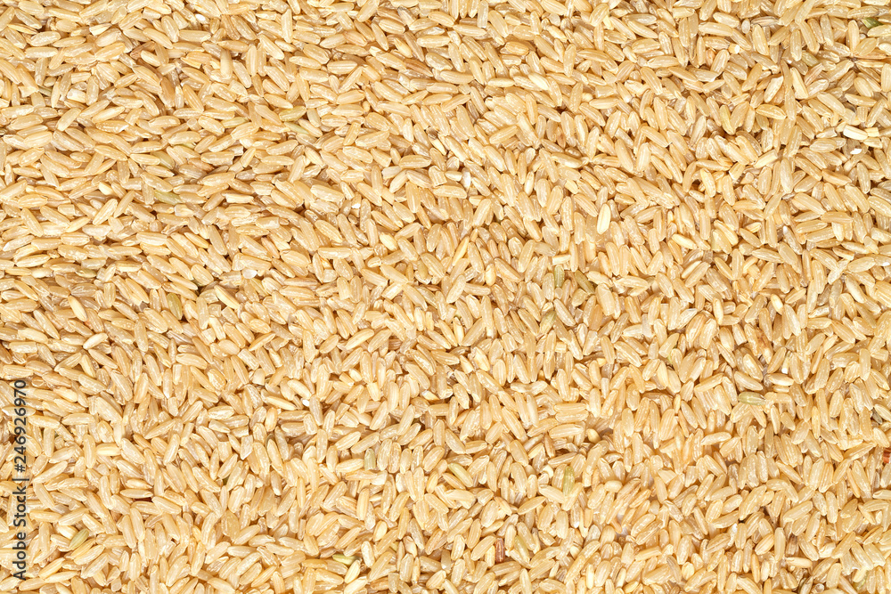 Organic brown rice texture background, top view. Organic brown rice texture background, top view.