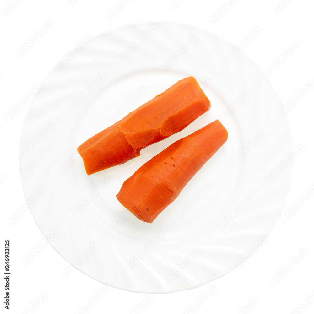 Boiled carrots in a plate on a white background Boiled carrots in a plate on a white background