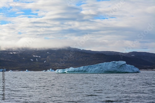 Disko Bay, Greenland - July - boat trip in the morning over the arctic sea - cold and fresh air and big beautiful icebergs, quiet moments in a wonderful nature © Friederike