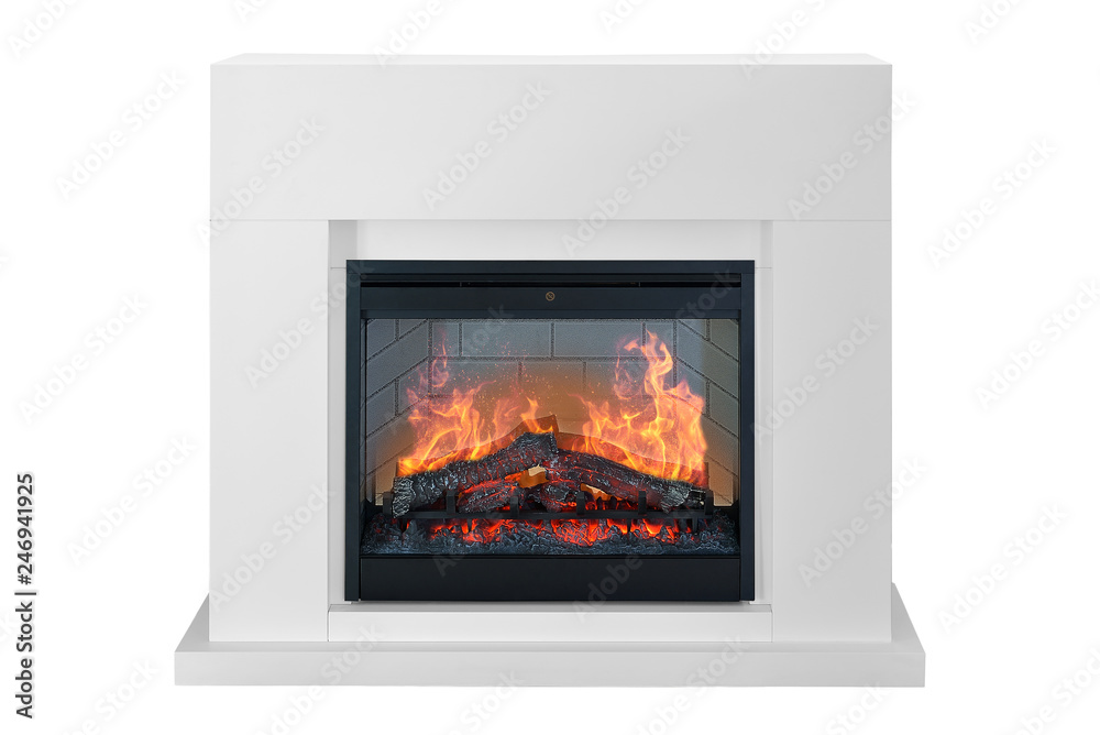 White wooden burning fireplace with roaring flames. Isolated on white background, clipping path included. Fireplace as a piece of furniture