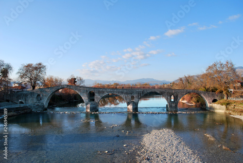 The ancient Bridge of Arta in Greece photo