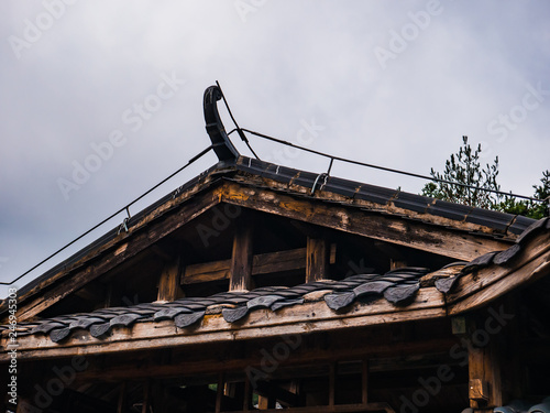 Ancient chinese architecture Roof with beautiful sky at Zhangjiajie National Forest Park in Wulingyuan District Zhangjiajie City China © Sumeth