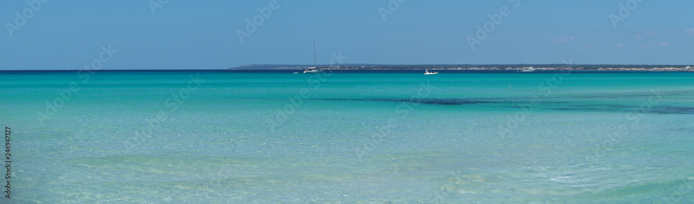 Colonia Sant Jordi, Spain. Amazing landscape of the charming beach Es Trenc. It has earned the reputation of Caribbean beach of Mallorca Colonia Sant Jordi, Spain. Amazing landscape of the charming beach Es Trenc. It has earned the reputation of Caribbean beach of Mallorca