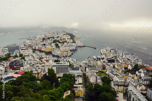 Panoramic view of the archipelago, the beautiful Alesund town centre and the amazing Sunnmore Alps from Fjellstua Viewpoint, More og Romsdal, Norway