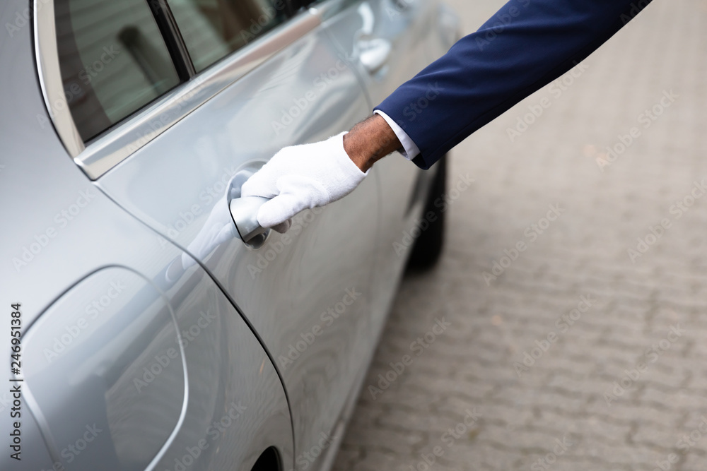 Valet's Hand Opening Car Door