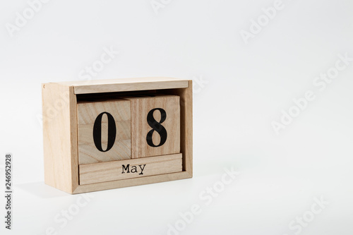 Wooden calendar May 08 on a white background