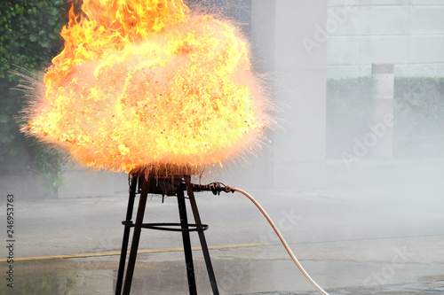 Fire explosion on the kitchenware, outdoors, prepared in a fire drill