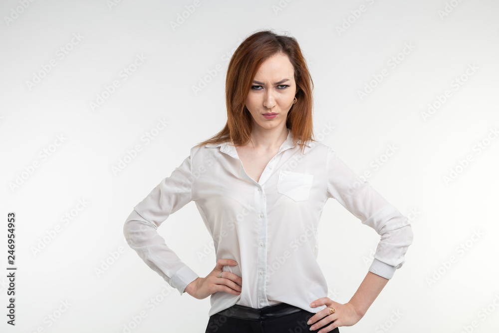 Portrait of a frustrated angry woman on white background Portrait of a frustrated angry woman on white background
