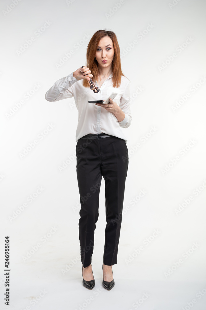 Makeup artist, beauty and people concept - Beautiful korean young woman holding palette of colorful eye shadows and brushes on white background Makeup artist, beauty and people concept - Beautiful korean young woman holding palette of colorful eye shadows and brushes on white background