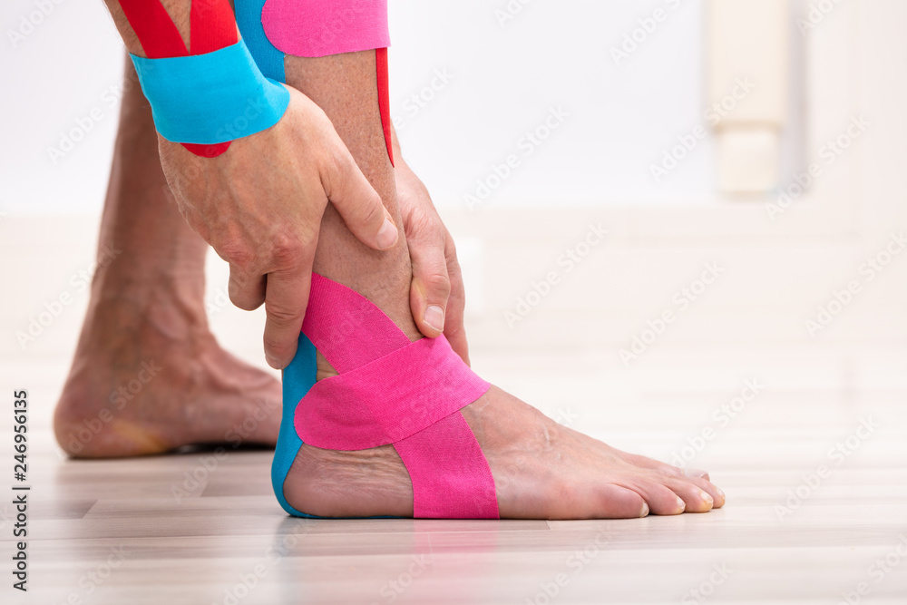 Fototapeta premium Male Foot With Physio Tape
