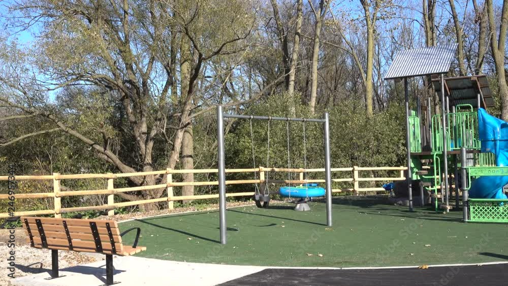 4K Outdoor Playground Swingset With Trees Panorama Right To Left 4K Outdoor Playground Swingset With Trees Panorama Right To Left