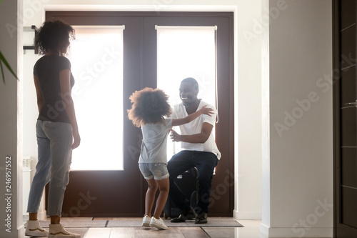 Photos Happy kid daughter excited to meet african american dad arriving coming home aft