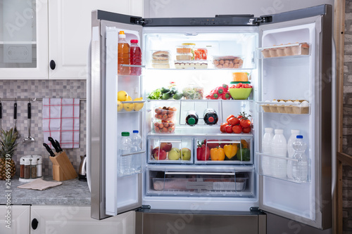 Close-up Of An Open Refrigerator photo