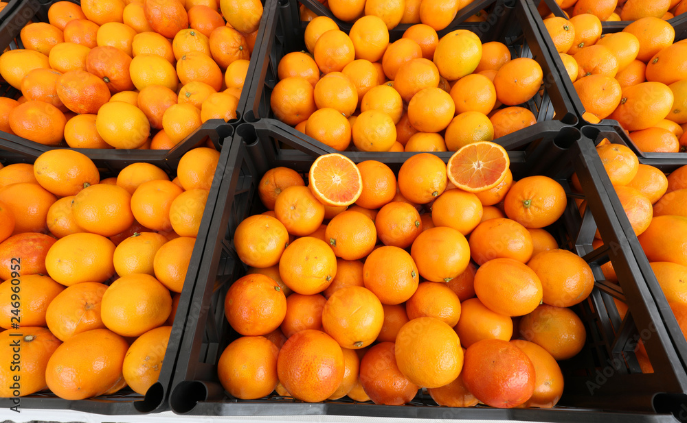 boxes of fresh ripe oranges