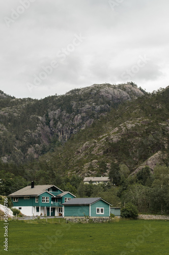 House below mountains © Sebastian