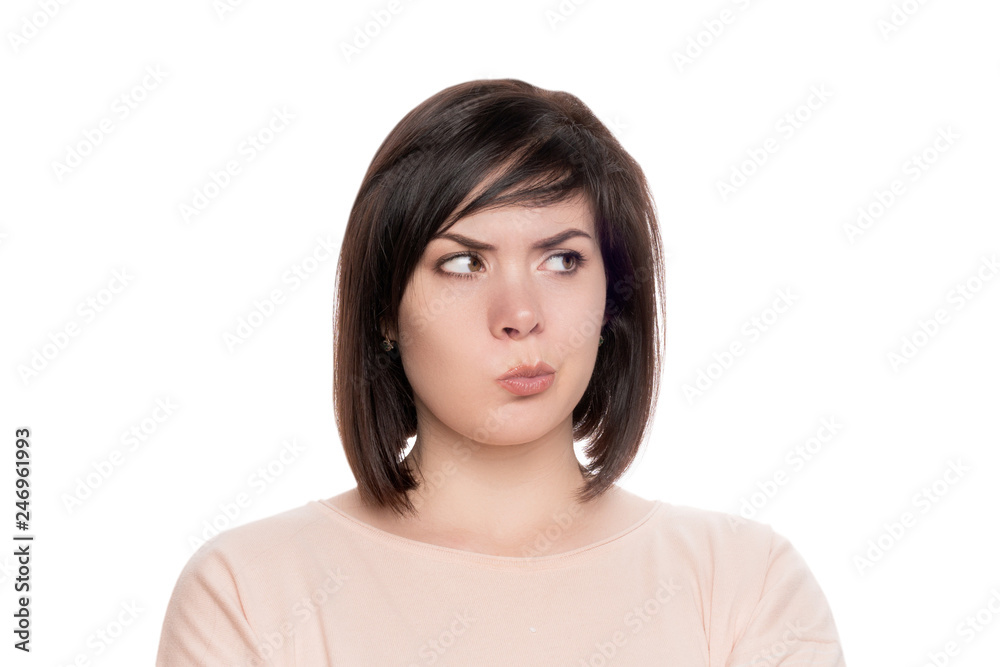 woman in doubt. cute brunette on white isolate background woman in doubt. cute brunette on white isolate background