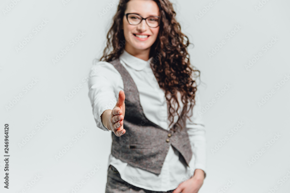 Funny portrait of an excited woman in glasses sunglasses. Close-up of a portrait of a young professional business woman makes the expression a funny face isolated on white background. Ready to Funny portrait of an excited woman in glasses sunglasses. Close-up of a portrait of a young professional business woman makes the expression a funny face isolated on white background. Ready to