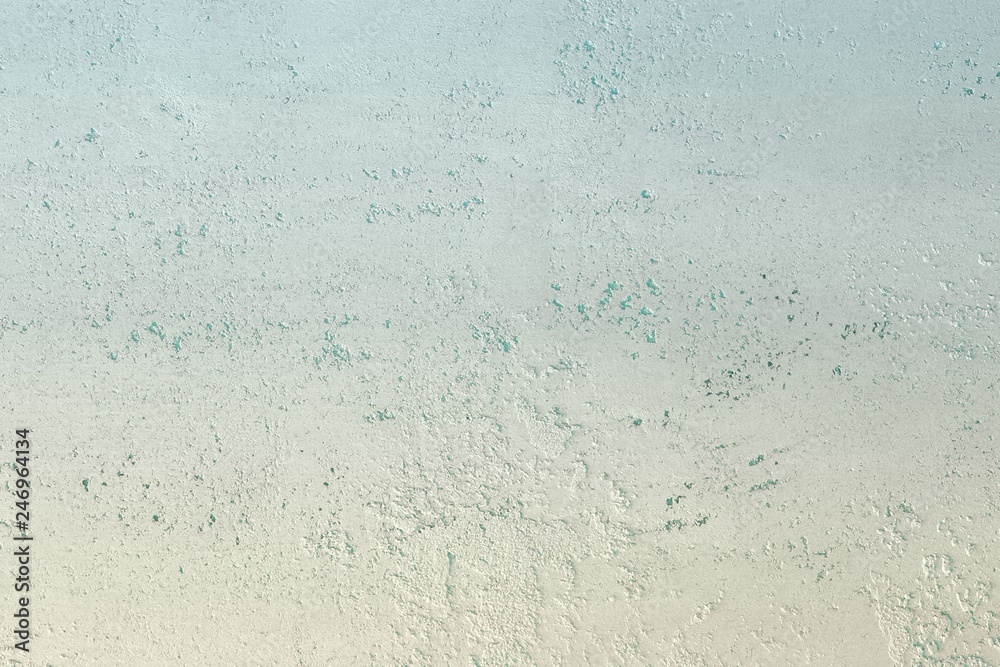 Obraz premium beautiful shabby light blue travertine like plaster texture for any purposes.
