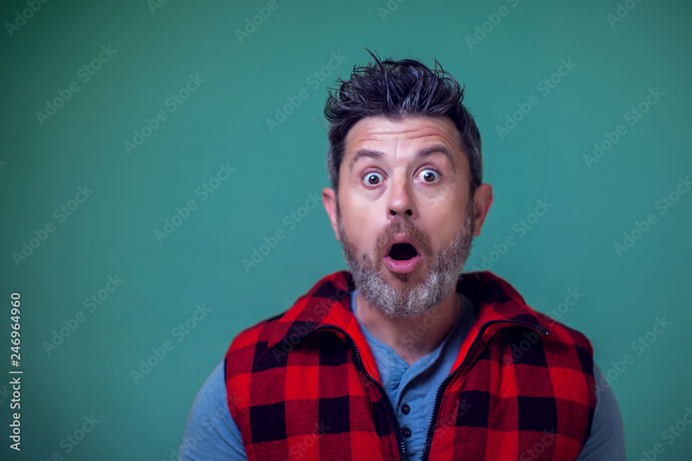 People and emotions - a portrait of man surprised about something People and emotions - a portrait of man surprised about something