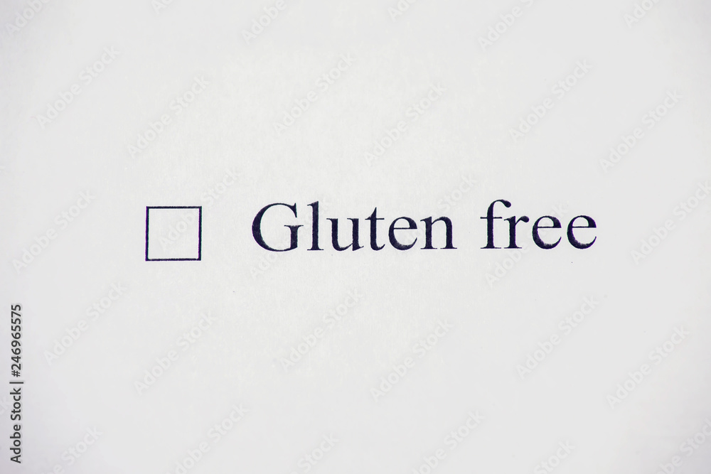 Checklist box with words gluten free and pen on white paper. Check form concept Checklist box with words gluten free and pen on white paper. Check form concept