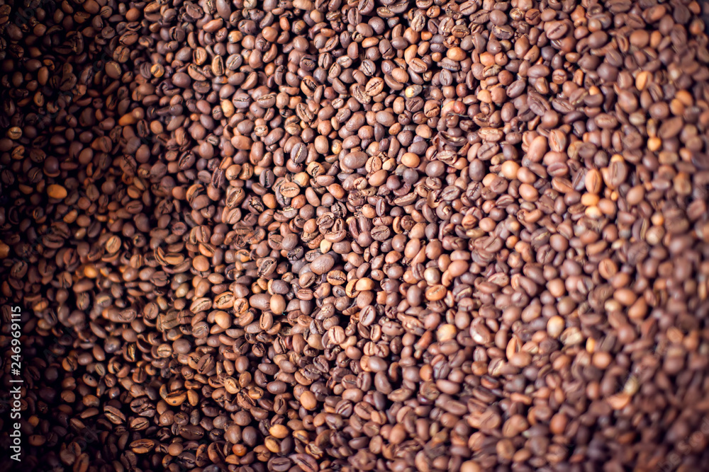 Roasted brown coffee beans pattern, background, top view texture. Organic food concept Roasted brown coffee beans pattern, background, top view texture. Organic food concept