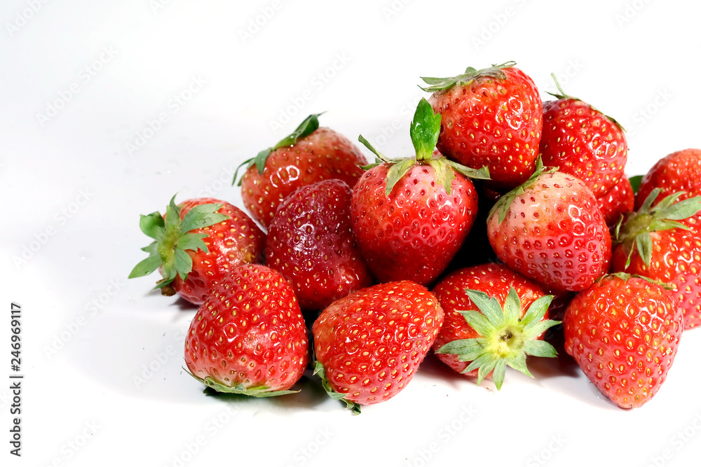 Red strawberry on white background and space for write wording, popular western fruit feed in higher part of Thailand, feel good meaningful fruit for love especially for valentines events Red strawberry on white background and space for write wording, popular western fruit feed in higher part of Thailand, feel good meaningful fruit for love especially for valentines events