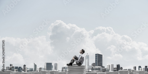 Businessman dreaming about future business.
