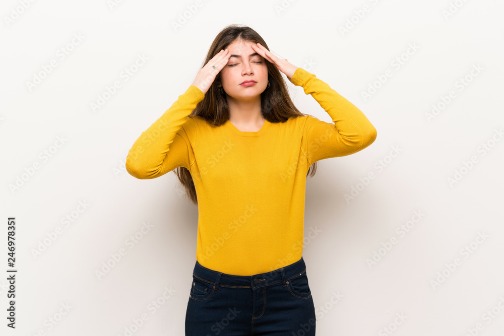 Young woman with yellow sweater unhappy and frustrated with something Young woman with yellow sweater unhappy and frustrated with something