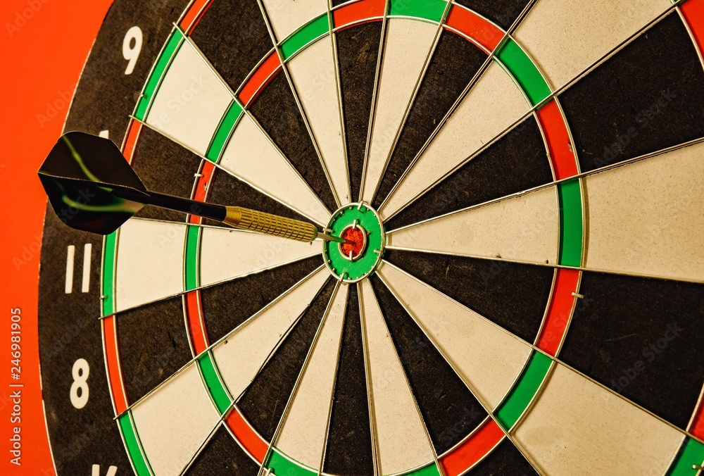 darts game one black arrows on a red background. darts game one black arrows on a red background.