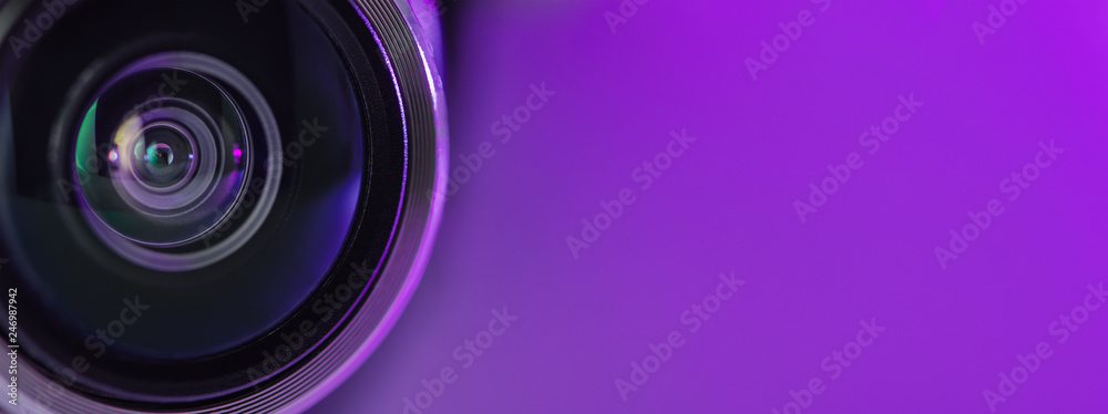 Banner. The camera lens and light lilac color. Banner. The camera lens and light lilac color.