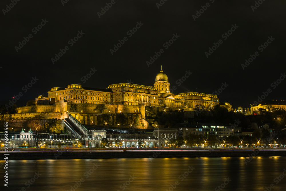 Buda Castle on the banks of the Danube River in Budapest at night. Hungary