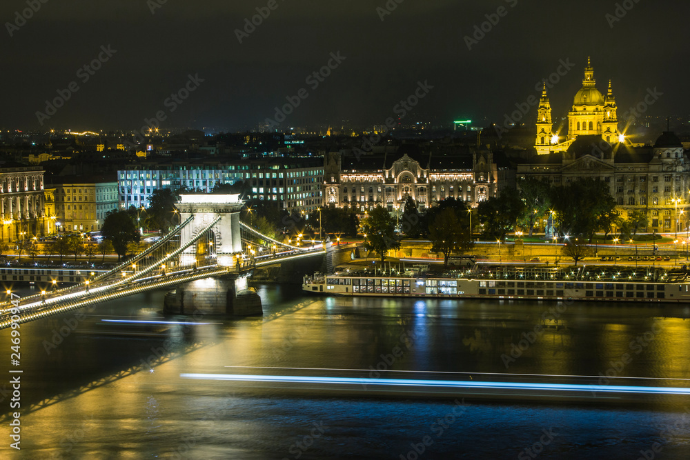 A night view of the Danube River and bridges in Budapest. Hungary
