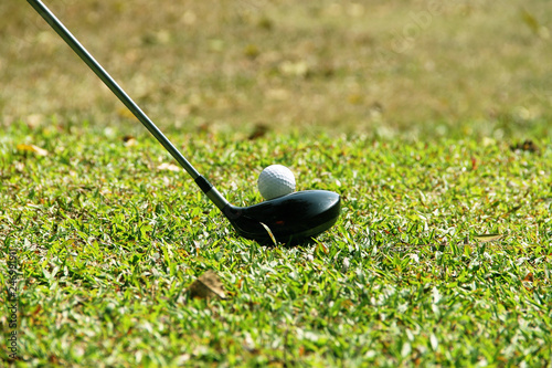 Golf club and golf ball close up in golf coures at Thailand
