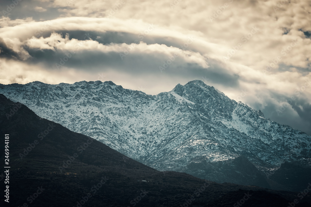 Snow capped peak of Monte Grosso mountain in Corsica Snow capped peak of Monte Grosso mountain in Corsica