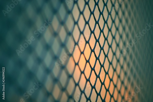 fence net with sun light background