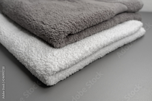 Stack of towels. White and gray