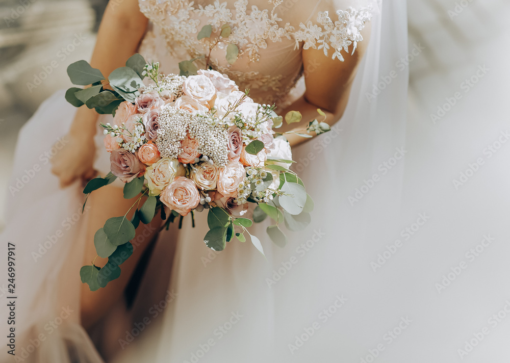 Beauty wedding bouquet in bride's hands. Wedding day - obrazy, fototapety, plakaty 