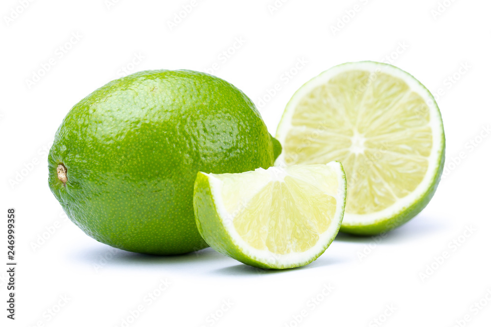 Whole and half with slice of fresh green lime isolated on white background. Citrus fruits Whole and half with slice of fresh green lime isolated on white background. Citrus fruits