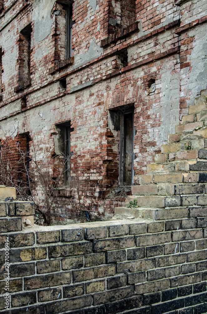 City ruins, old brick building in a state of decay.