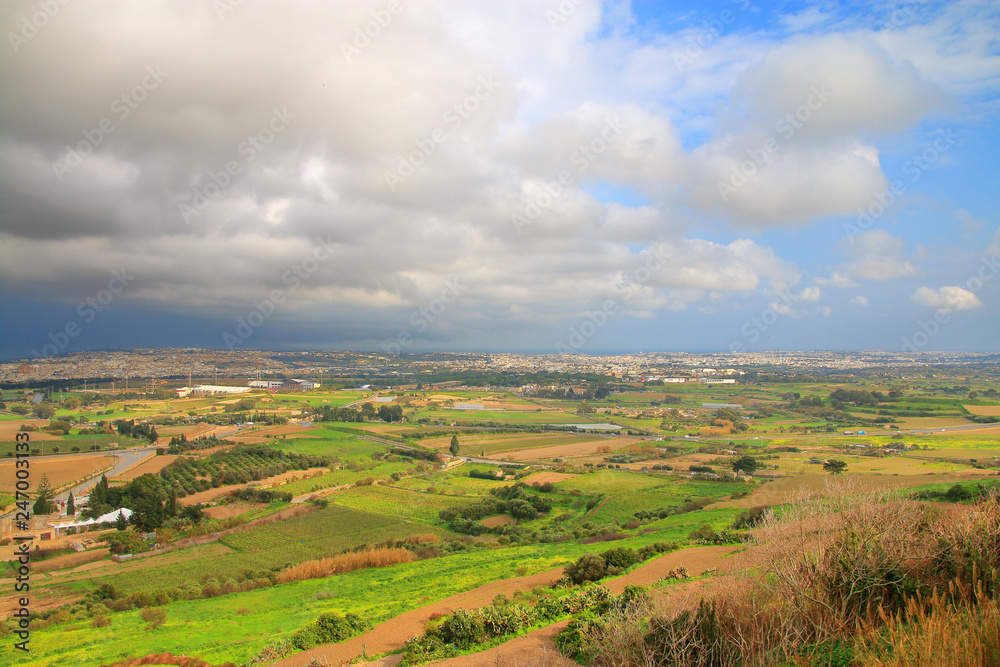 The end of the thunderstorm over the valley near the ancient city of Mdina in Malta.