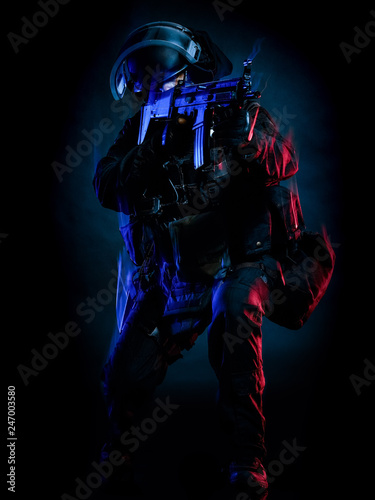 one soldier police swat tactical forces man studio shot isolated on black background